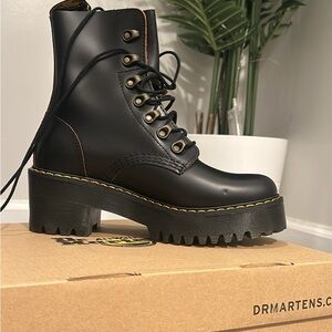 Dr. Martens Black Combat Boots with Chunky Sole and Lace-Up Design